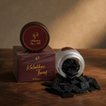 Kalkas Taraf scented oud 48g — loose flat-cut oud chips beside a frosted jar and a printed Medieval Aloud box