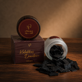 Kalakas Downtown scented oud 48g — loose flat-cut oud chips beside a frosted jar and a printed Medieval Aloud box